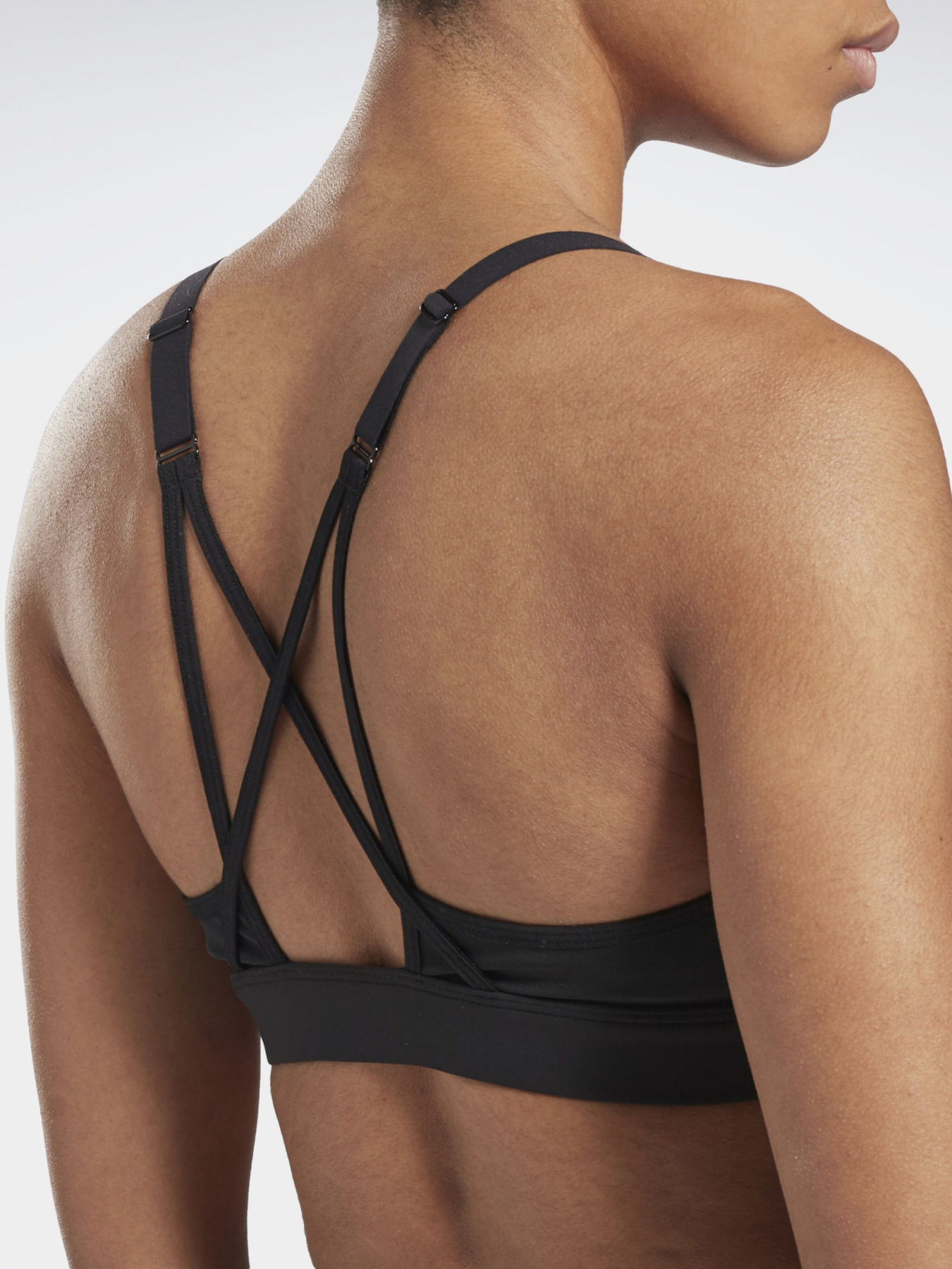 Топ спортивный Reebok  LUX STRAPPY MEDIUM-IMPACT модель GI8321 Фото