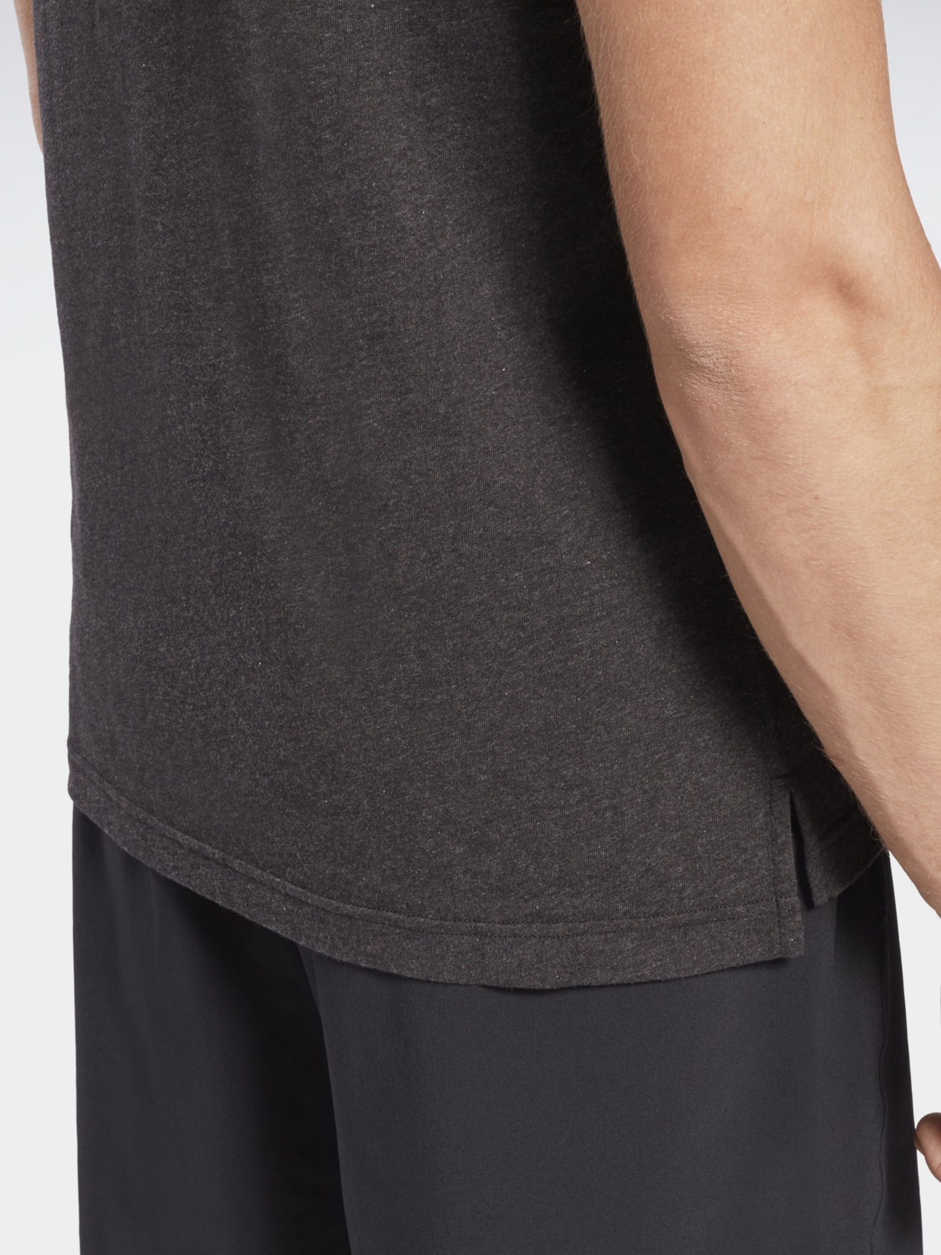 Футболки і поло Reebok TE MELANGE SS модель GI8567 Фото