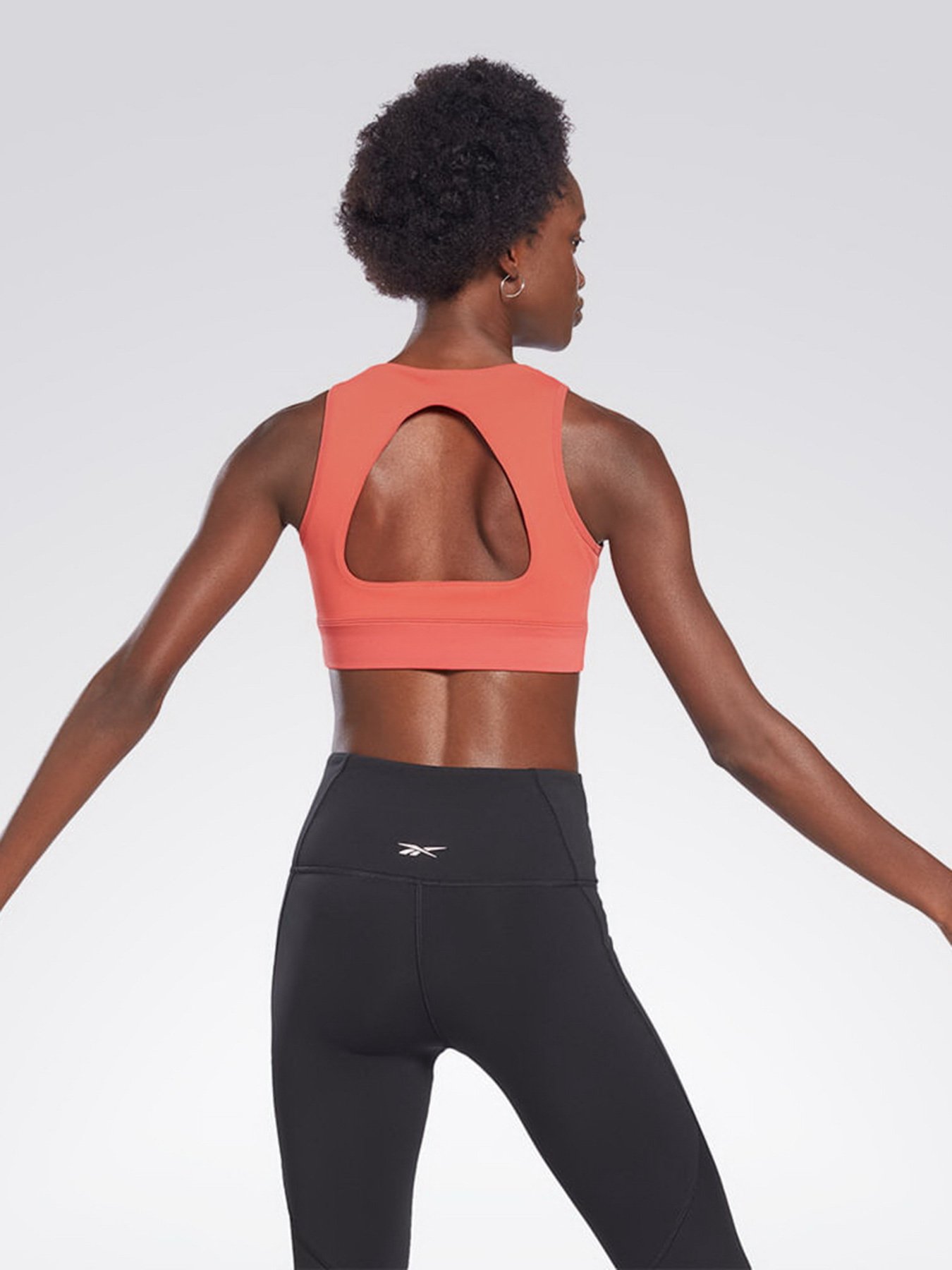 Спортивний топ Reebok Studio Beyond модель H56395 Фото