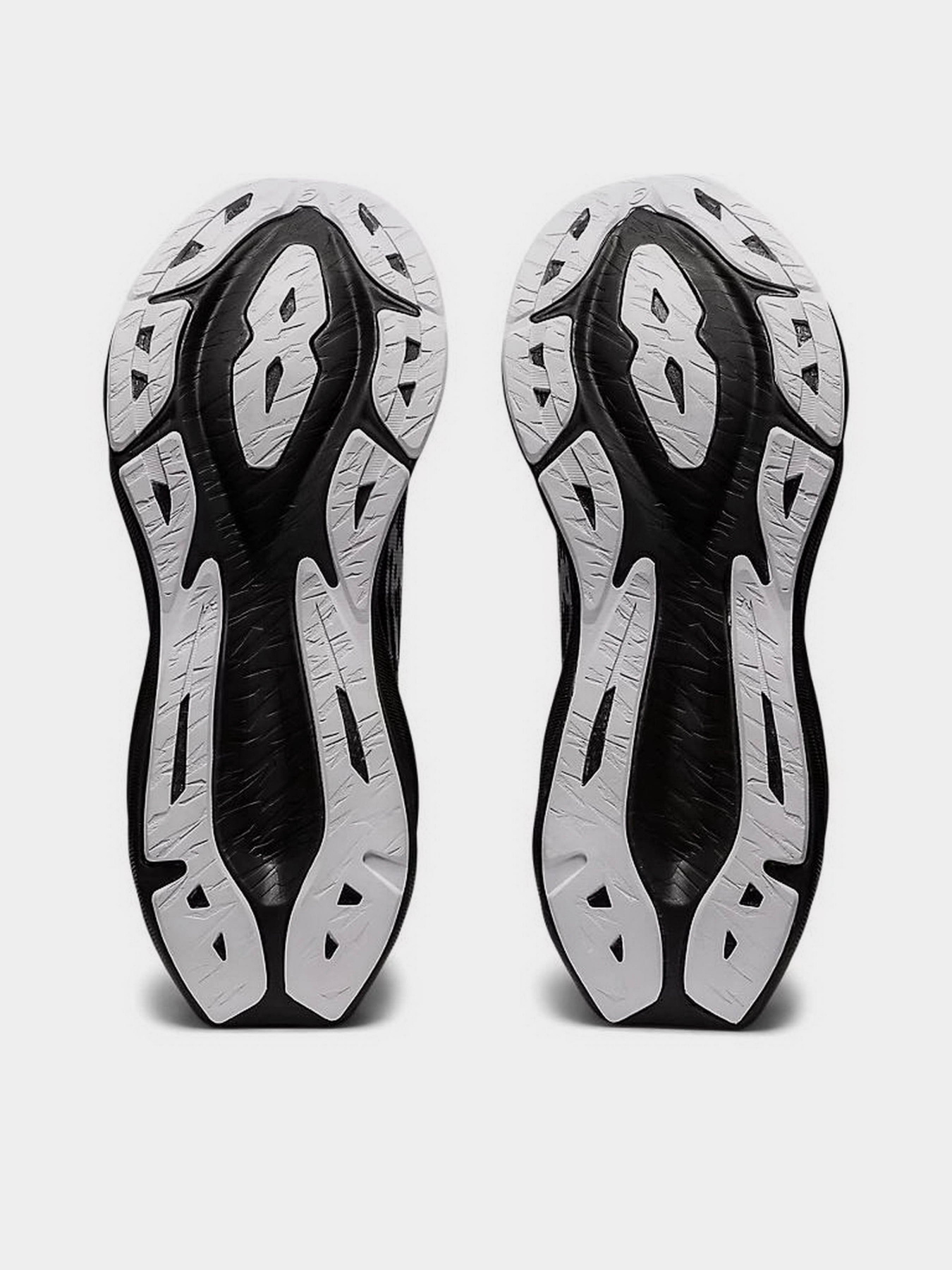 Кроссовки для бега Asics Novablast 3 модель 1011B458-002 Чорний, білий Фото