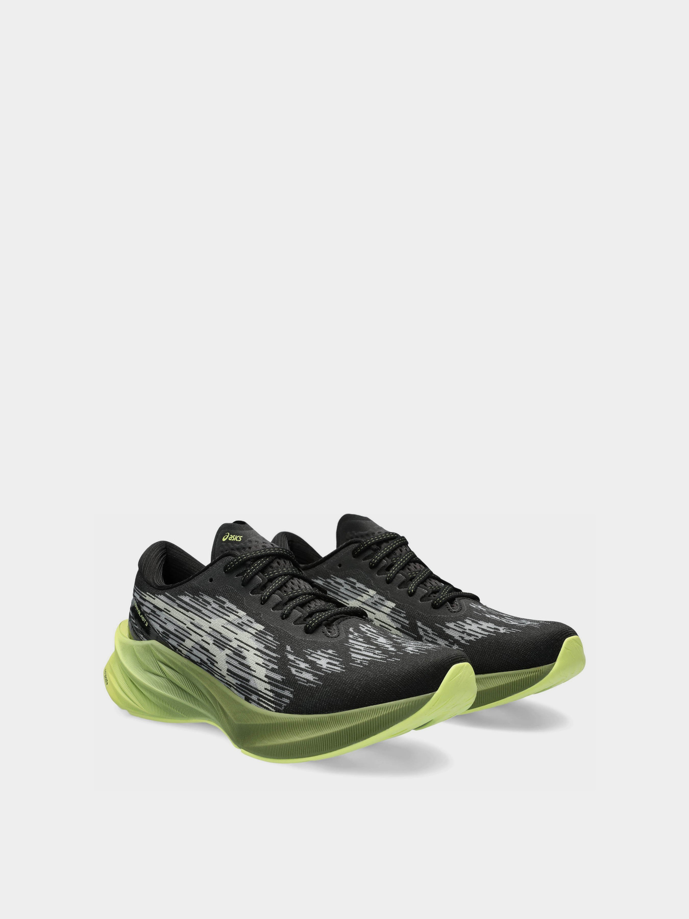 Кроссовки для бега Asics Novablast 3 модель 1011B458-005 Чорний, зелений Фото