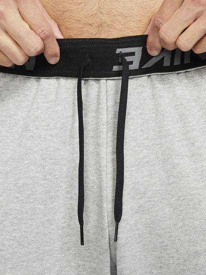 Спортивні штани NIKE DRI-FIT TAPERED модель CZ6379-063 — фото 4 - INTERTOP