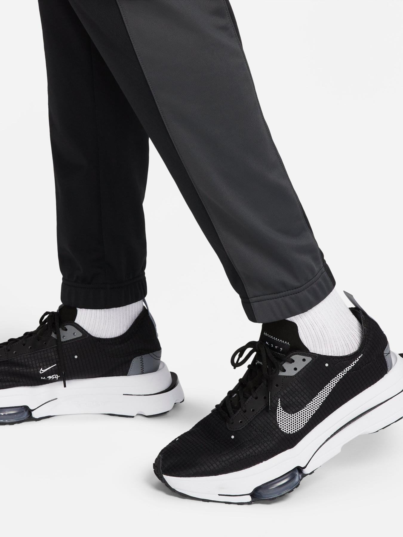 Костюмы NIKE Sport Essentials модель DM6843-010 Костюмы NIKE Sport Essentials модель DM6843-010 Фото