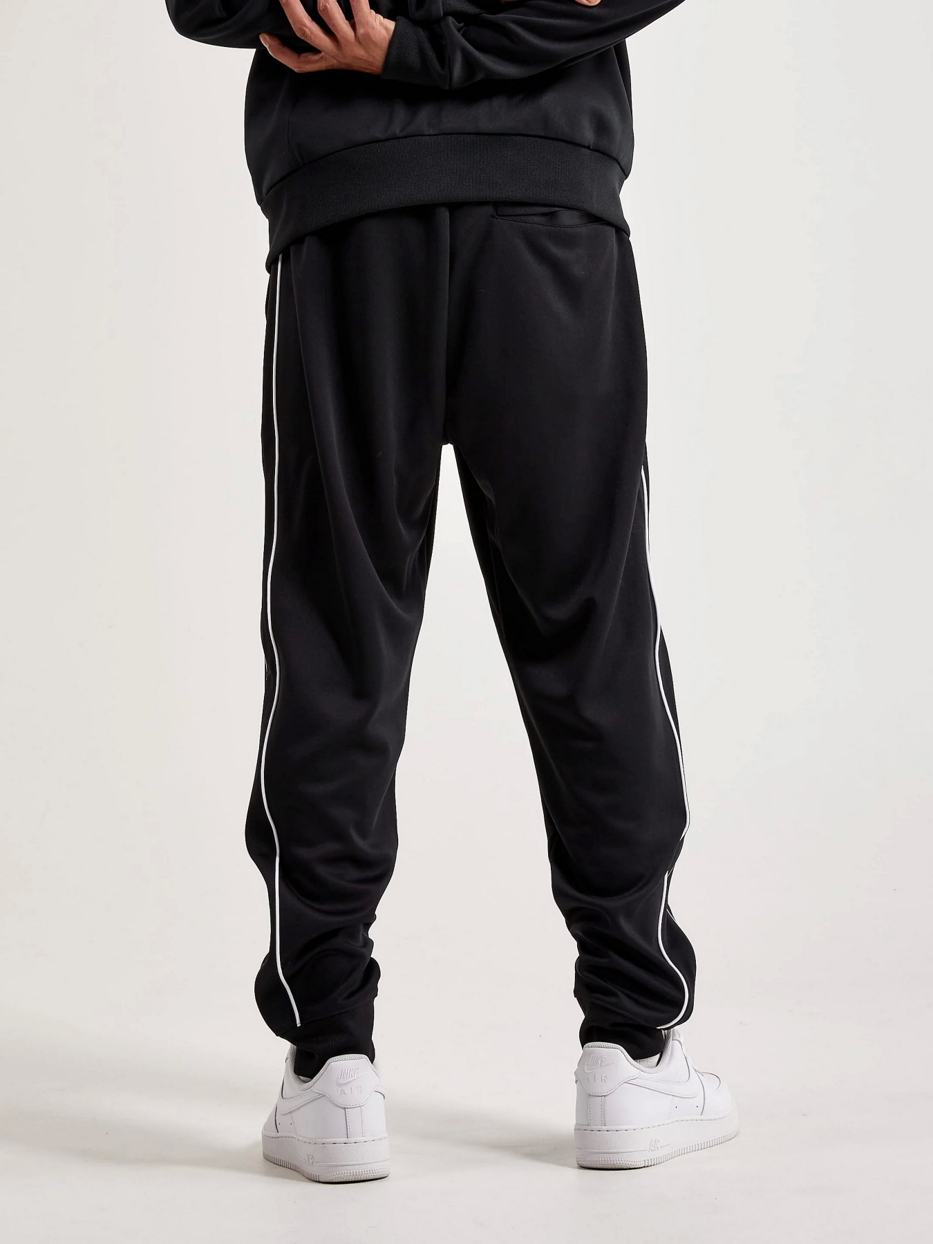Штаны спортивные NIKE M NK CLUB PK PANT модель DX0615-010 Штаны спортивные NIKE M NK CLUB PK PANT модель DX0615-010 Фото
