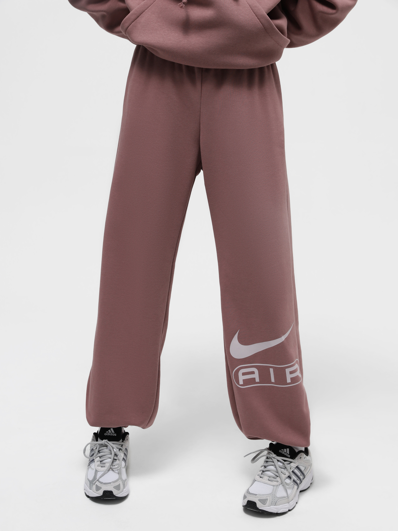 Спортивні штани NIKE AIR FLEECE модель FN1902-208 Спортивні штани NIKE AIR FLEECE модель FN1902-208 Фото