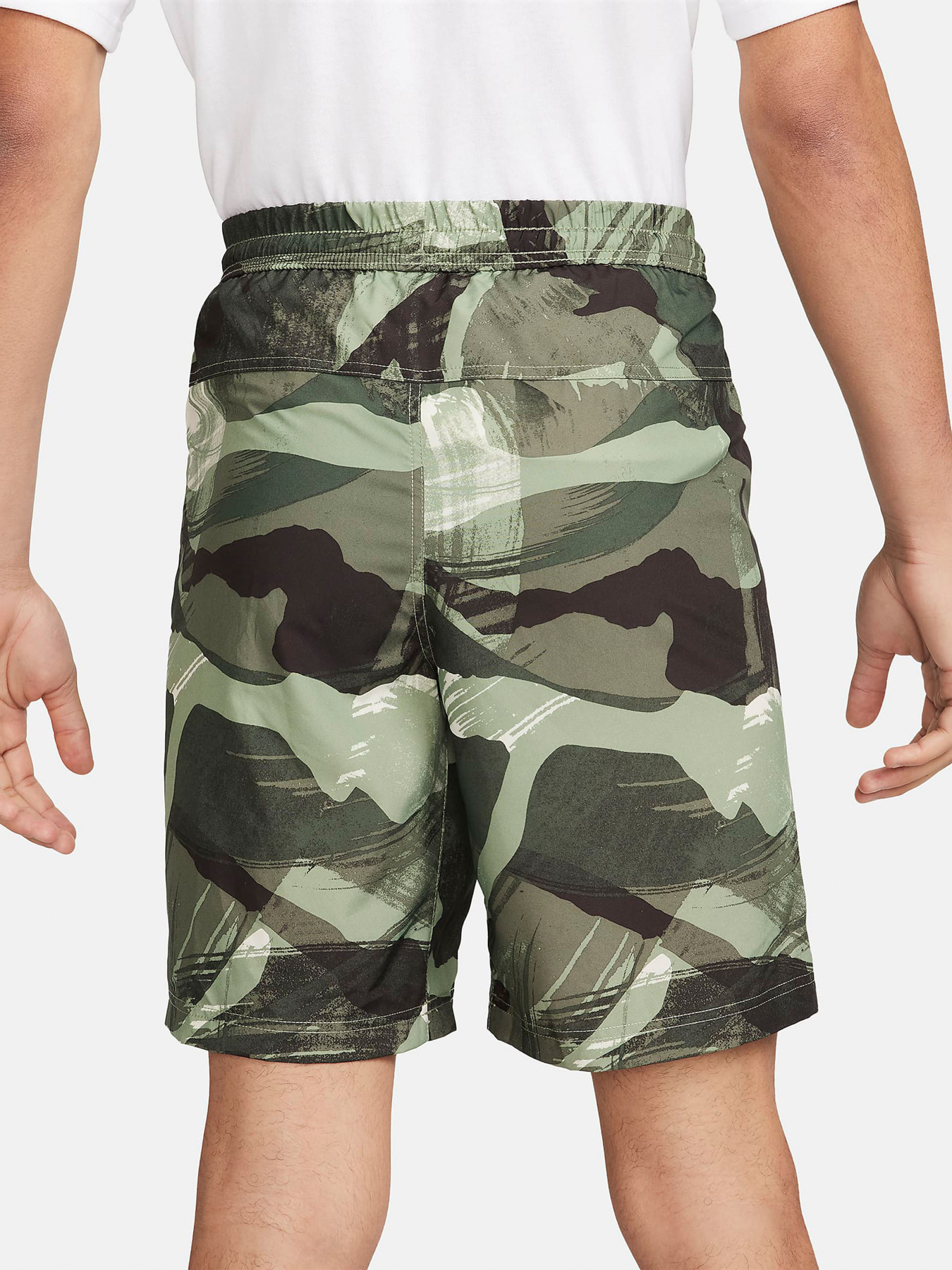 Шорты спортивные NIKE Dri-FIT 9 Unlined Versatile модель FN3046-386 Фото