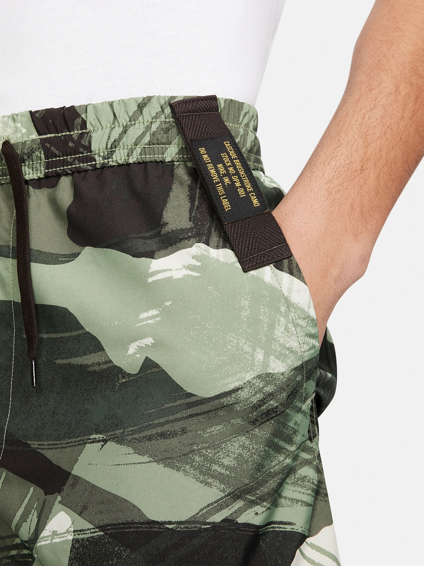 Шорты спортивные NIKE Dri-FIT 9 Unlined Versatile модель FN3046-386 Фото