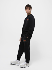Штани спортивні NIKE Club Fleece Cuffed модель FV4453-010 Фото