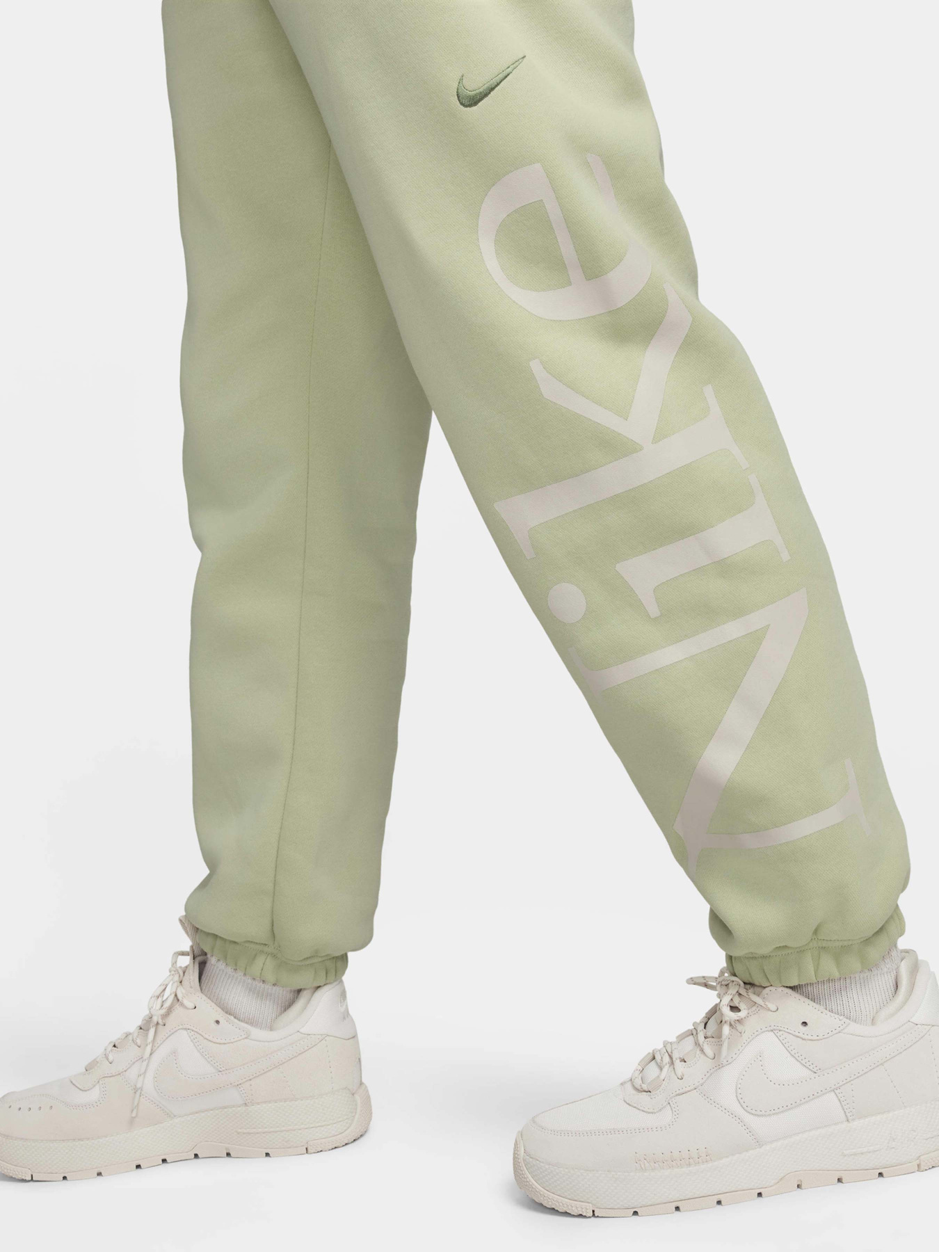 Брюки NIKE PHNX FLC OS LOGO модель FN2552-371 Брюки NIKE PHNX FLC OS LOGO модель FN2552-371 Фото