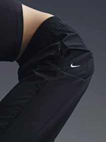 Спортивні штани NIKE WINDRUNNER модель FV7655-010 Фото