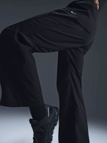 Спортивні штани NIKE WINDRUNNER модель FV7655-010 Фото