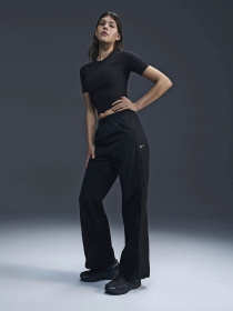 Спортивні штани NIKE WINDRUNNER модель FV7655-010 Фото