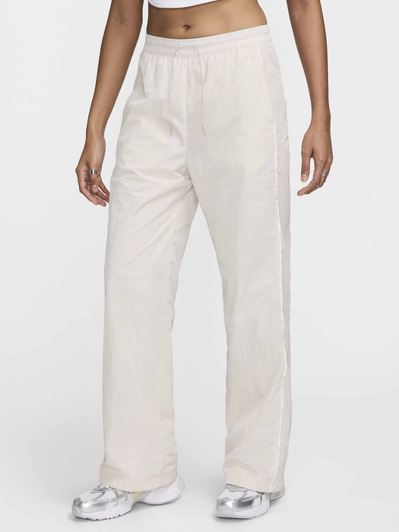 Штаны спортивные NIKE Windrunner модель FV7655-110 Фото