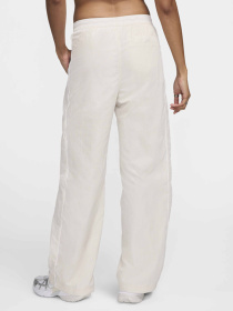 Штаны спортивные NIKE WINDRUNNER модель FV7655-110 Штаны спортивные NIKE WINDRUNNER модель FV7655-110 Фото