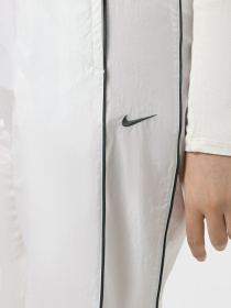 Штаны спортивные NIKE Windrunner модель FV7655-134 Фото