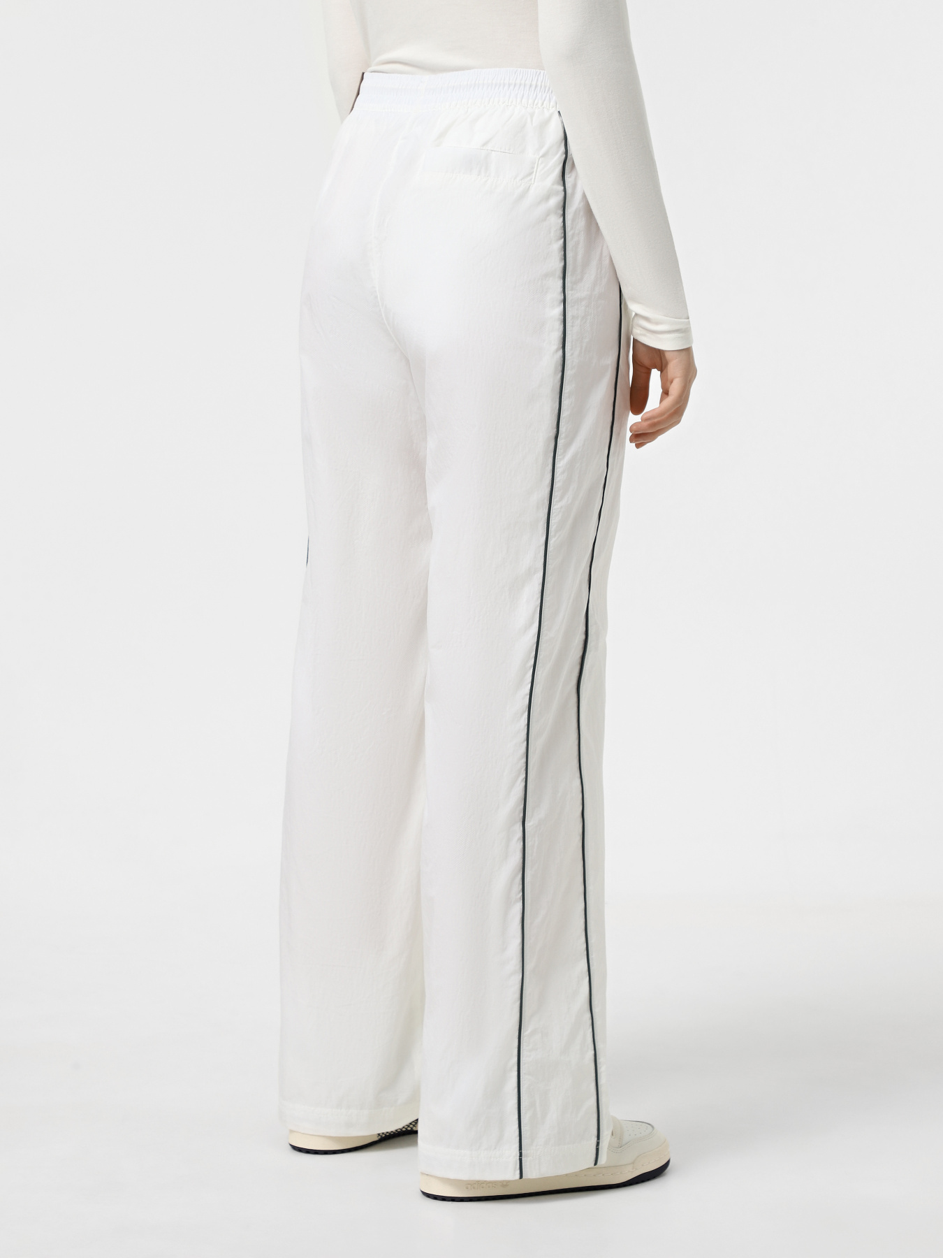 Штаны спортивные NIKE WINDRUNNER модель FV7655-134 Фото