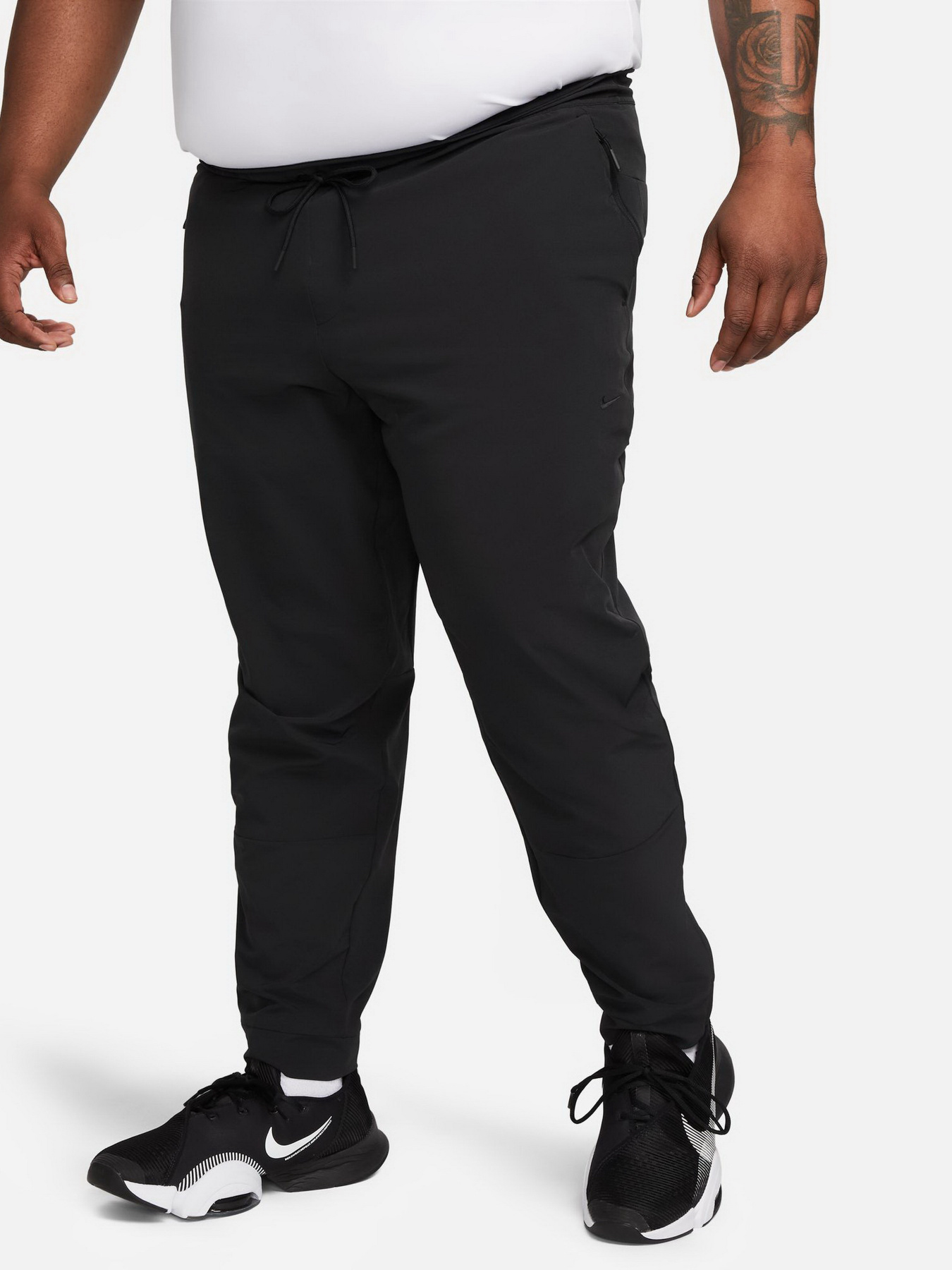 Штаны спортивные NIKE Dri-Fit Unlimited Pant Tapered модель FB7548-010 Фото