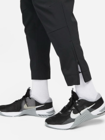 Штаны спортивные NIKE Dri-Fit Unlimited Pant Tapered модель FB7548-010 Фото