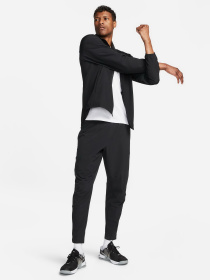 Штаны спортивные NIKE DRI-FIT UNLIMITED PANT TAPERED модель FB7548-010 Фото