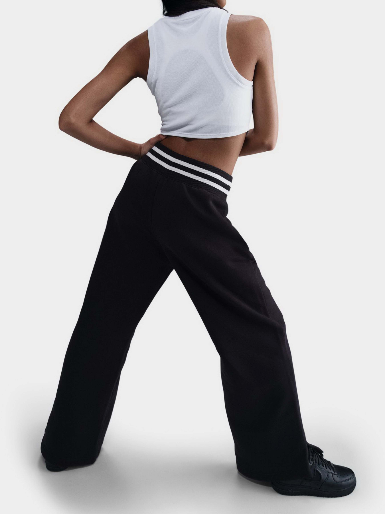 Штани повсякденні NIKE Sportswear Phoenix Fleece модель HJ0909-010 Фото