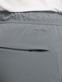 Штани спортивні NIKE Dri-Fit Unlimited Tapered Leg Versatile Training модель FB7548-084 Фото