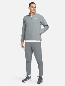 Штани спортивні NIKE Dri-Fit Unlimited Tapered Leg Versatile Training модель FB7548-084 Фото