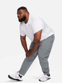 Штани спортивні NIKE Dri-Fit Unlimited Tapered Leg Versatile Training модель FB7548-084 Фото