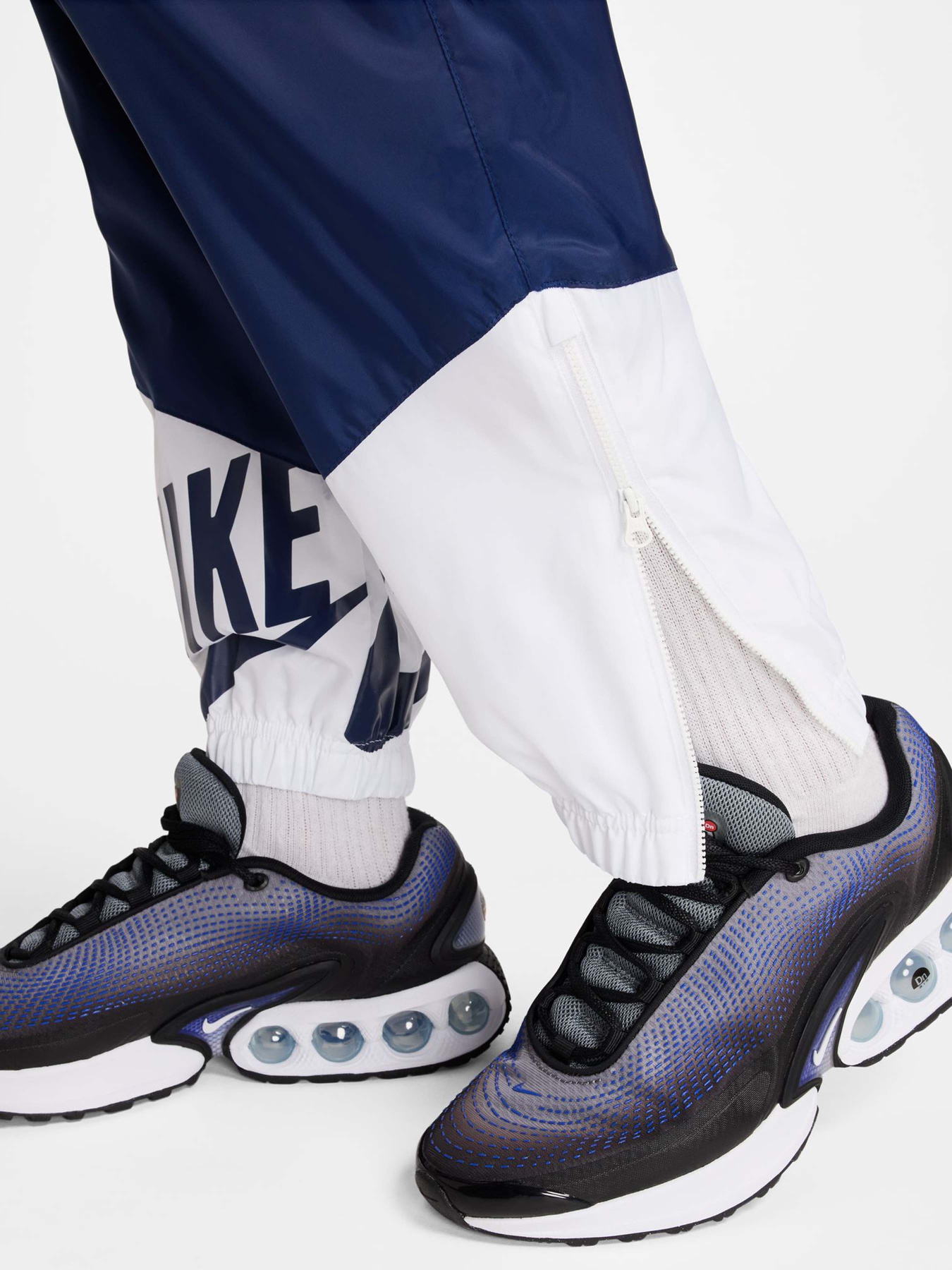 Штани спортивні NIKE Windrunner модель HJ2034-492 Фото