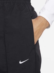 Спортивні штани NIKE TREND WOVEN модель FQ3588-010 Спортивні штани NIKE TREND WOVEN модель FQ3588-010 Фото
