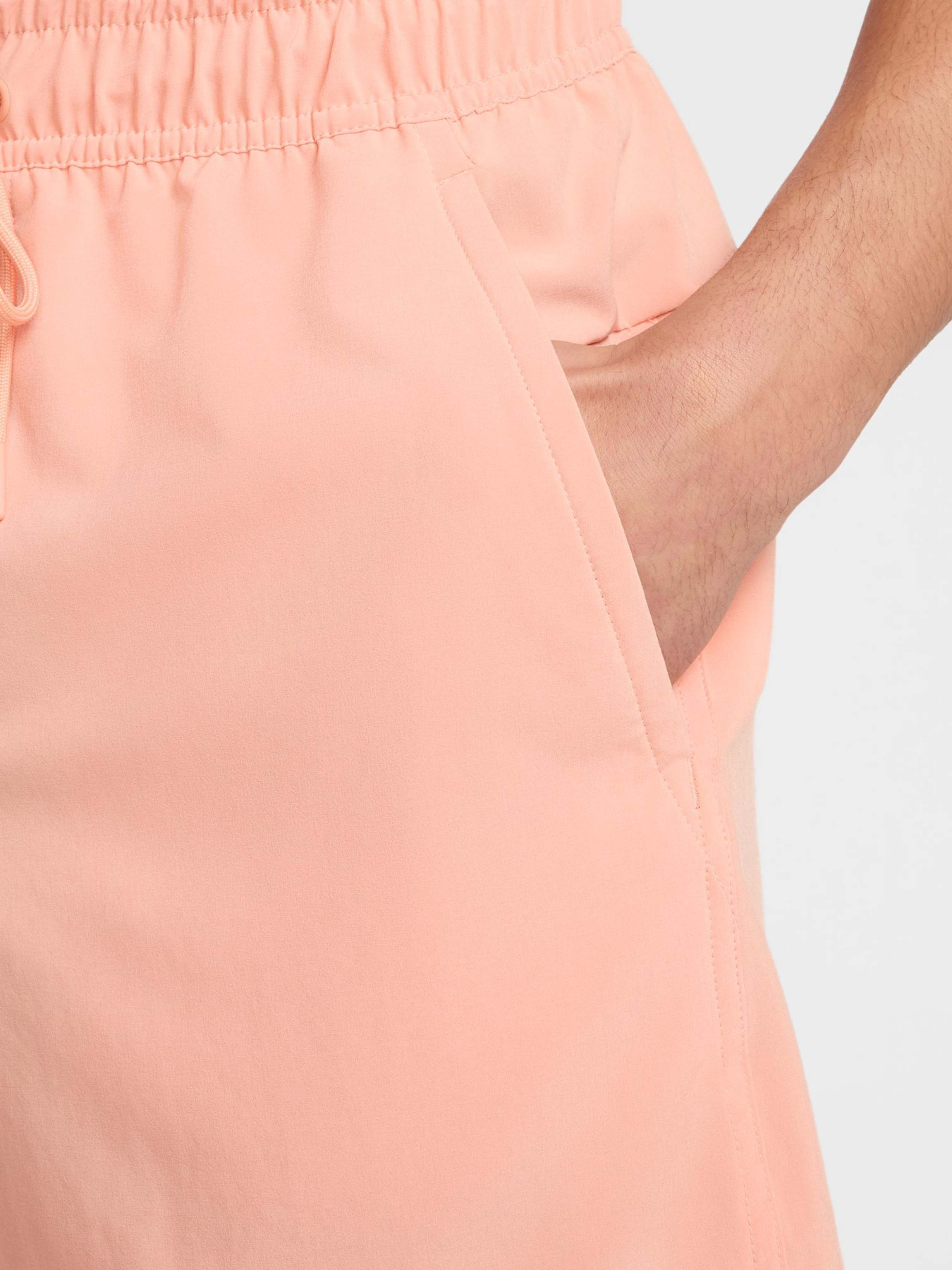 Спортивні шорти NIKE DRI-FIT UNLINED VERSATILE модель DV9340-844 Спортивні шорти NIKE DRI-FIT UNLINED VERSATILE модель DV9340-844 Фото