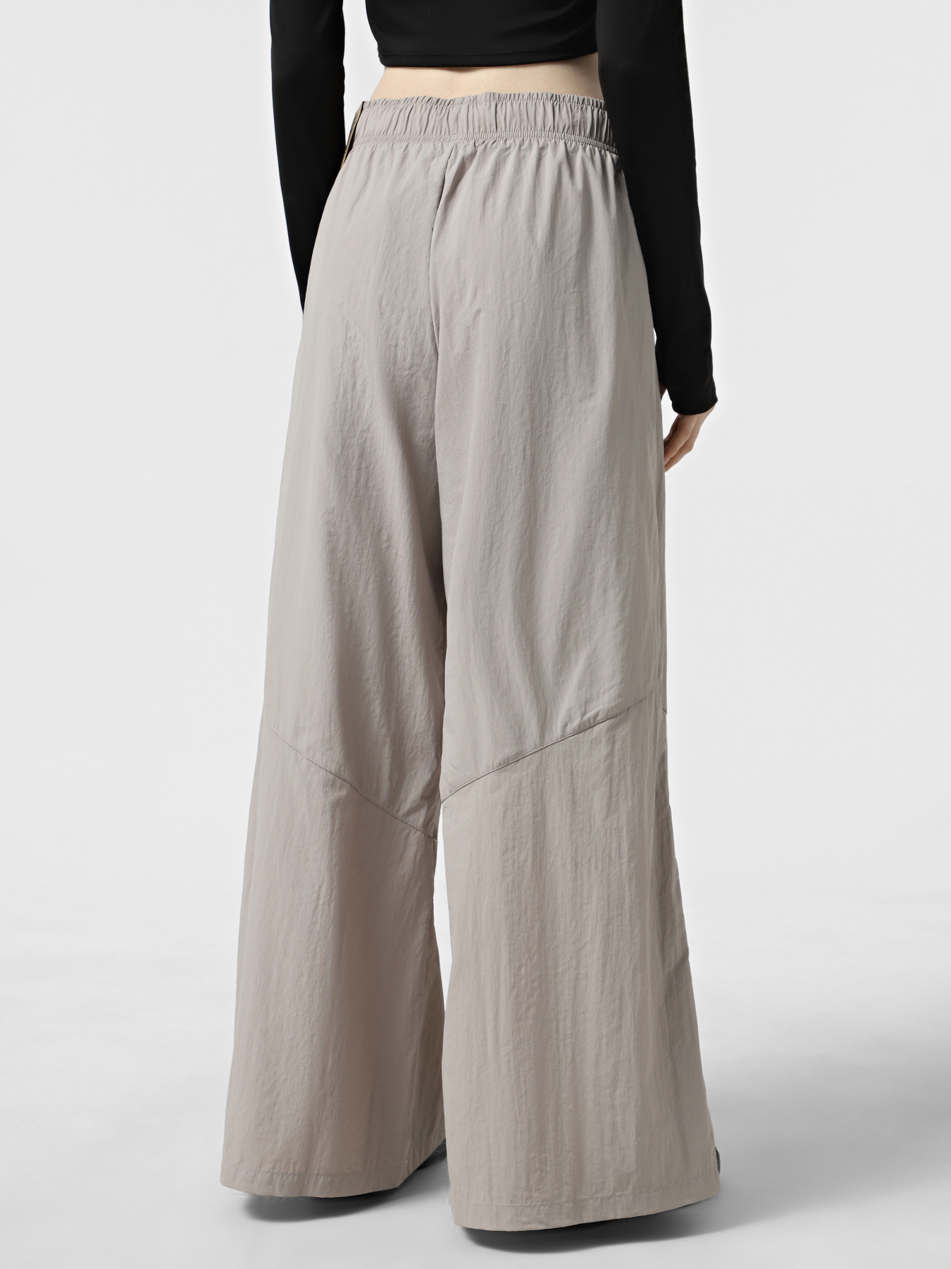 Спортивні штани NIKE SPORTSWEAR WOMEN'S WIDE-LEG WO модель IH8508-009 Спортивні штани NIKE SPORTSWEAR WOMEN'S WIDE-LEG WO модель IH8508-009 Фото