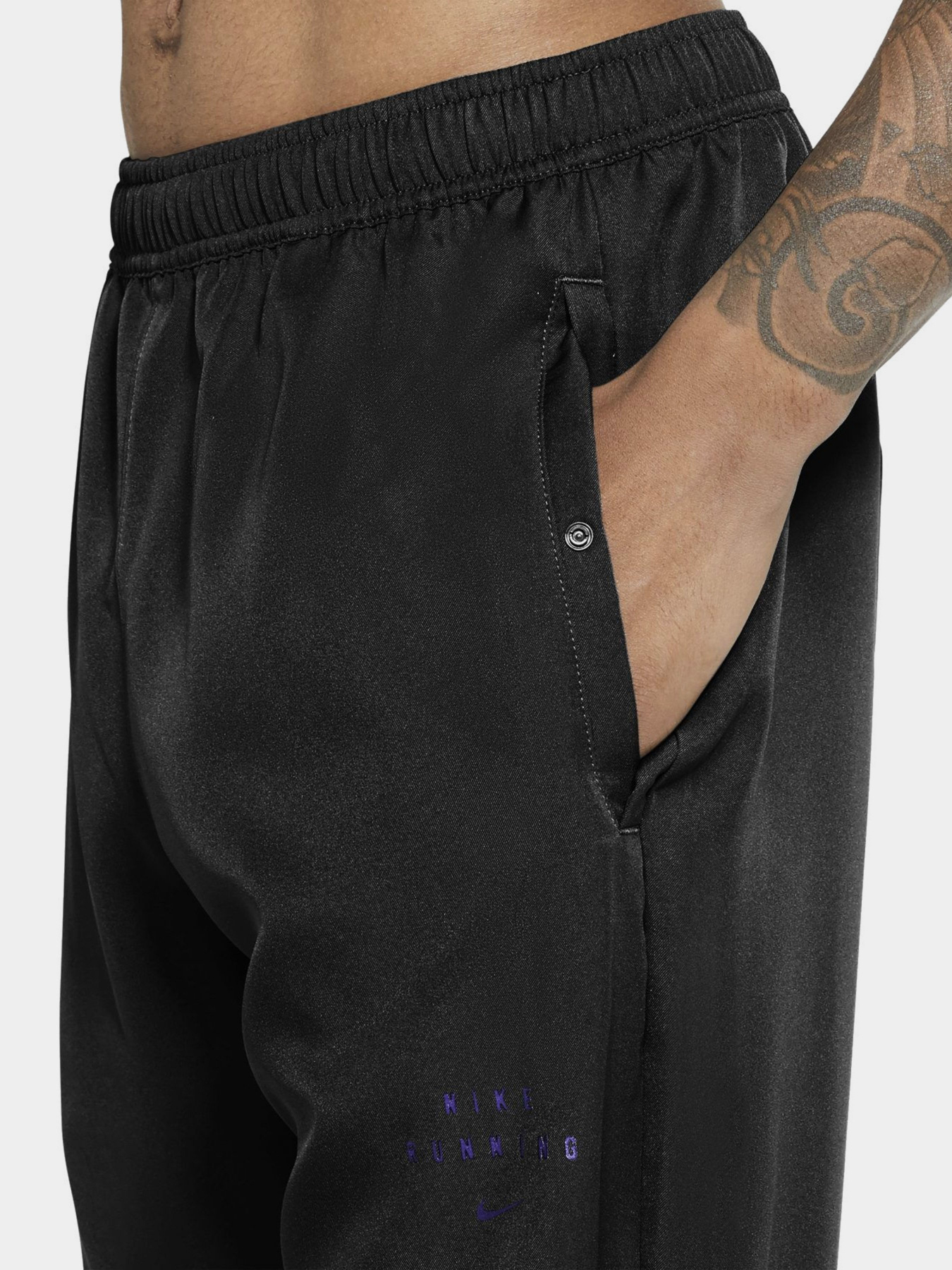 Спортивні штани NIKE Essential Run Division running pants модель DA0412-010 Фото