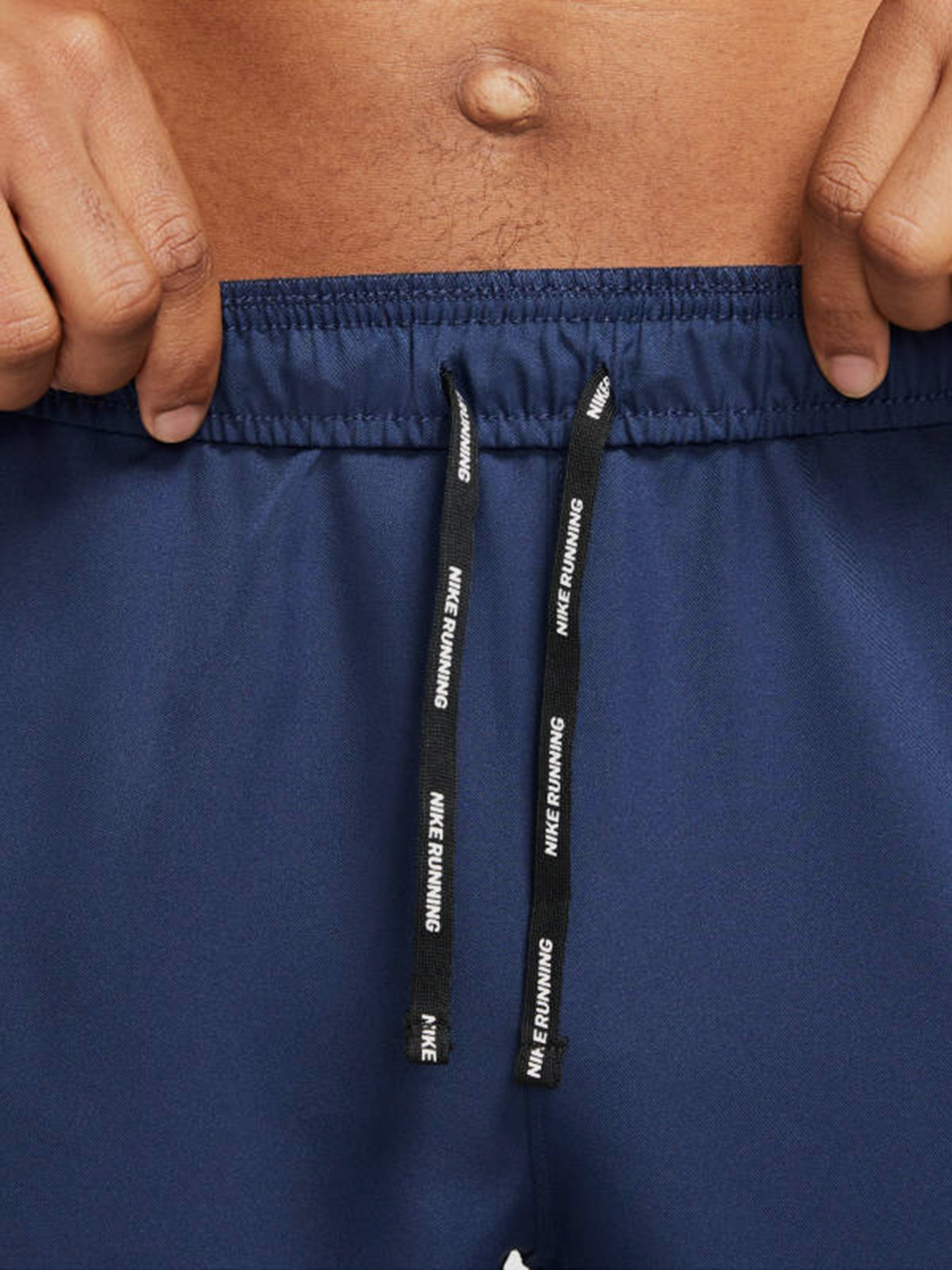 Спортивні штани NIKE Essential Run Division running pants модель DA0412-410 Фото