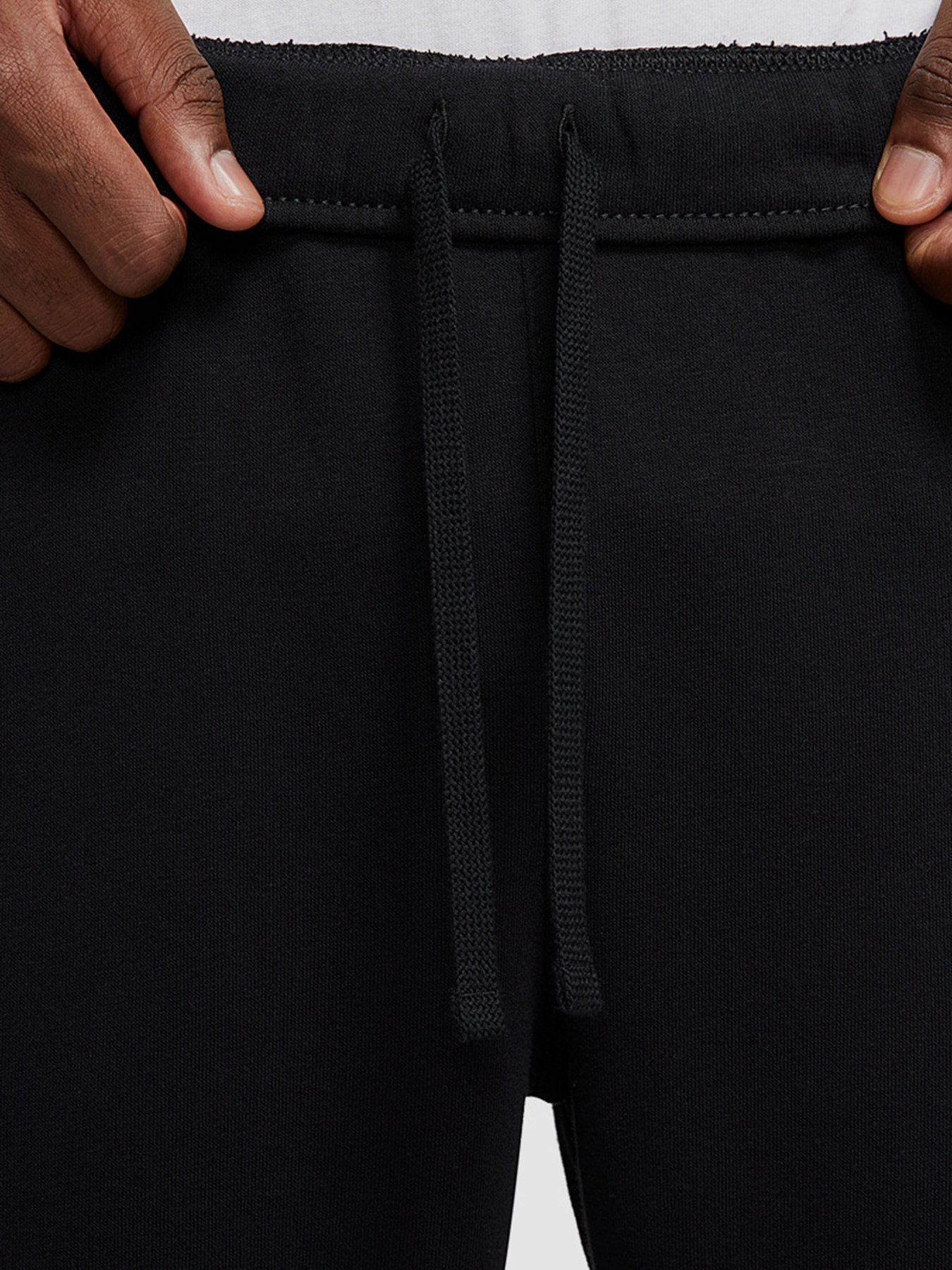 Спортивний костюм NIKE Nsw Ce Flc Trk Suit Basic модель CZ9992-010 Фото