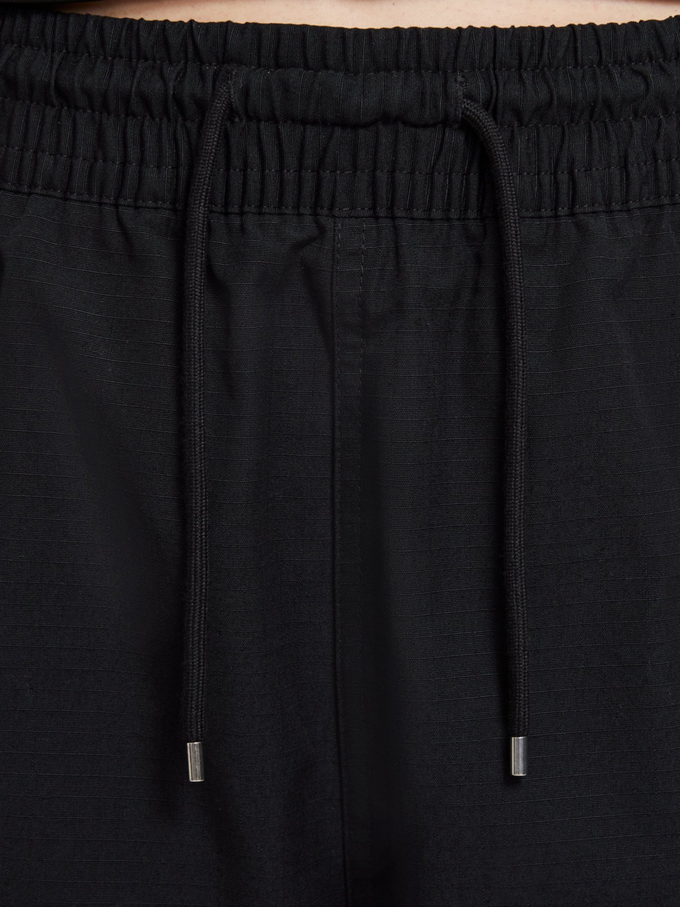 Штаны спортивные NIKE Sportswear Icon Clash модель CZ9330-010 Штаны спортивные NIKE Sportswear Icon Clash модель CZ9330-010 Фото