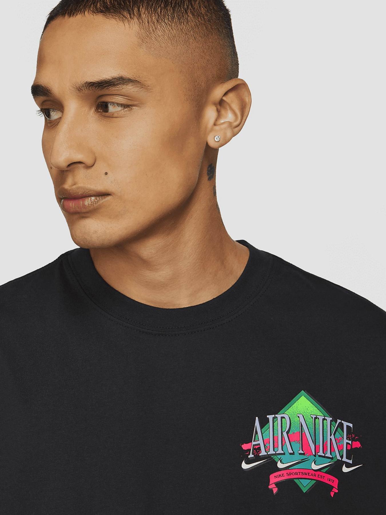 Футболки і поло NIKE Sportswear модель DD1376-010 Фото