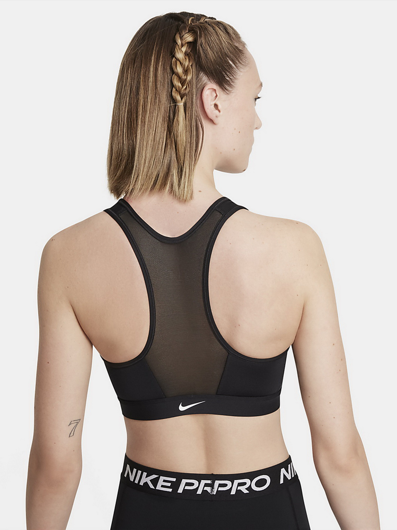 Топ спортивний NIKE Dri-FIT модель DD1205-010 Фото