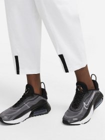 Штани спортивні NIKE Sportswear Tech Pack модель DD4616-100 Фото
