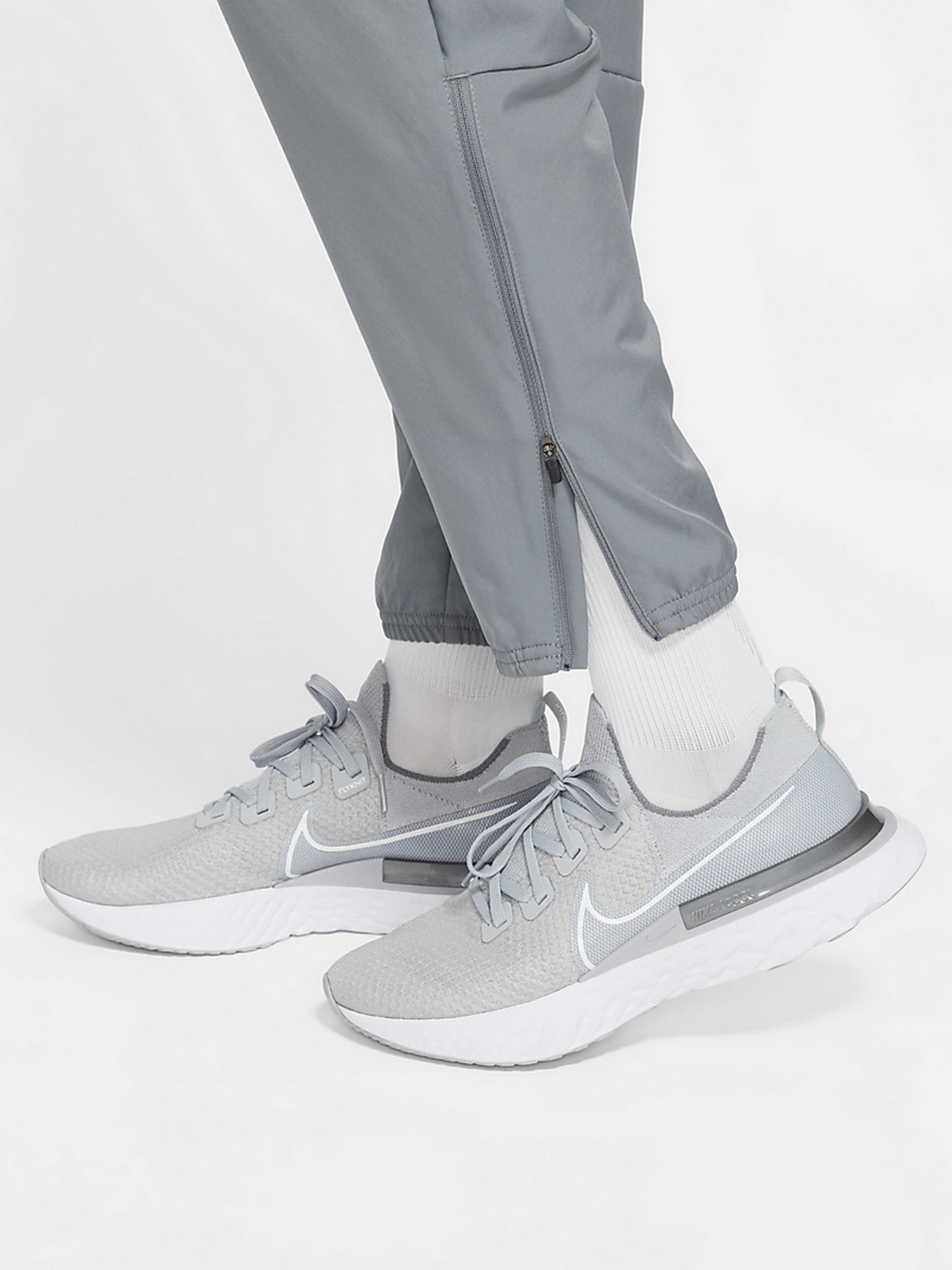 Штаны спортивные NIKE Dri-FIT Challenger Mens Woven Running Pants модель DD4894-084 Фото