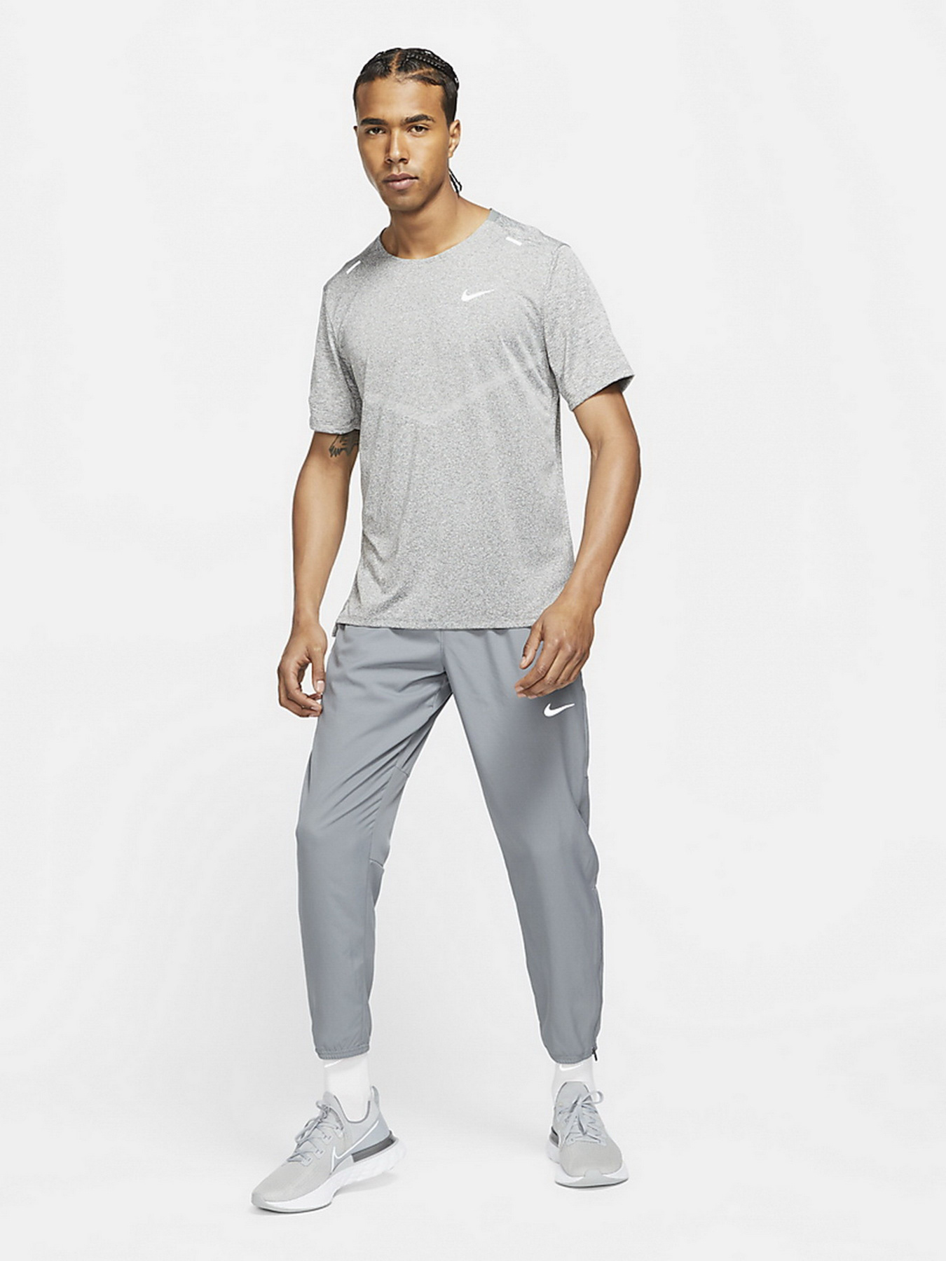 Штаны спортивные NIKE Dri-FIT Challenger Mens Woven Running Pants модель DD4894-084 Фото