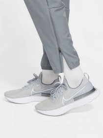 Штаны спортивные NIKE Dri-FIT Challenger Mens Woven Running Pants модель DD4894-084 Фото