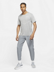 Штаны спортивные NIKE Dri-FIT Challenger Mens Woven Running Pants модель DD4894-084 Фото