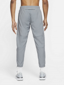 Спортивні штани NIKE Dri-FIT Challenger Mens Woven Running Pants модель DD4894-084 Спортивні штани NIKE Dri-FIT Challenger Mens Woven Running Pants модель DD4894-084 Фото