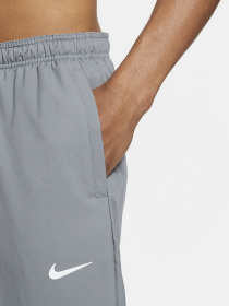 Спортивні штани NIKE Dri-FIT Challenger Mens Woven Running Pants модель DD4894-084 Спортивні штани NIKE Dri-FIT Challenger Mens Woven Running Pants модель DD4894-084 Фото