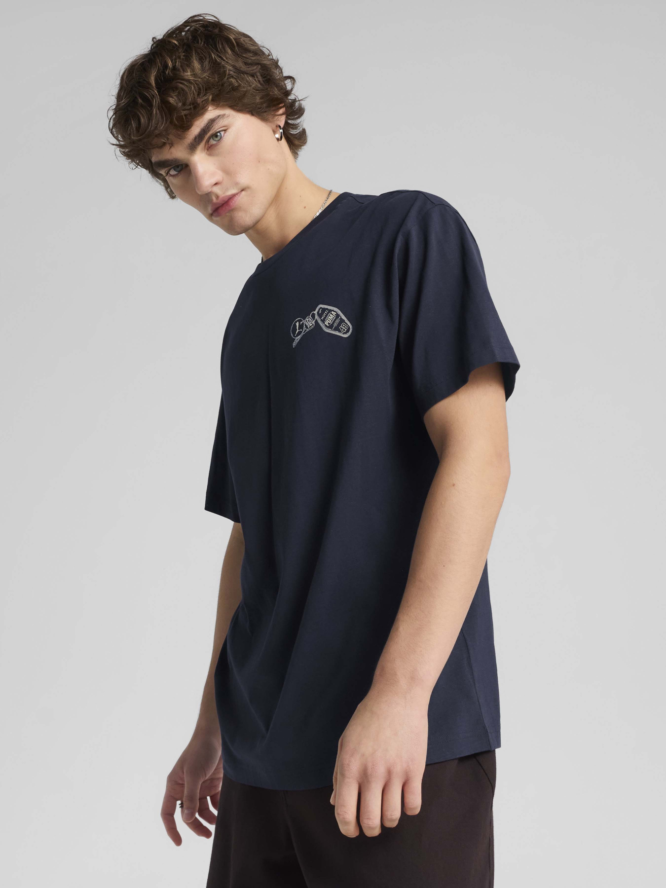 Футболка PUMA Graphics Hotel Relaxed модель 62963616 Фото