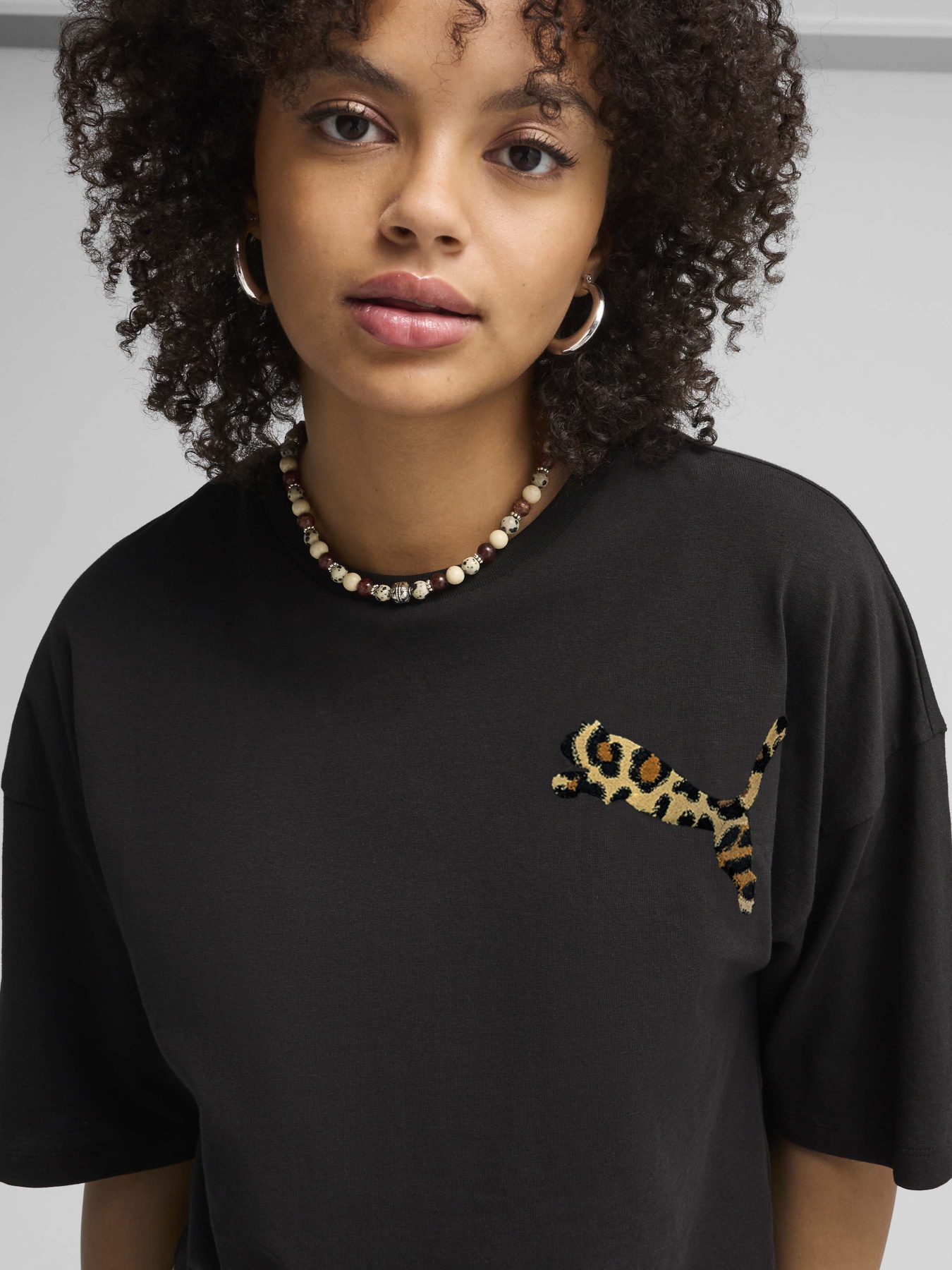 Футболка PUMA Leo Luxe модель 63233701 Фото