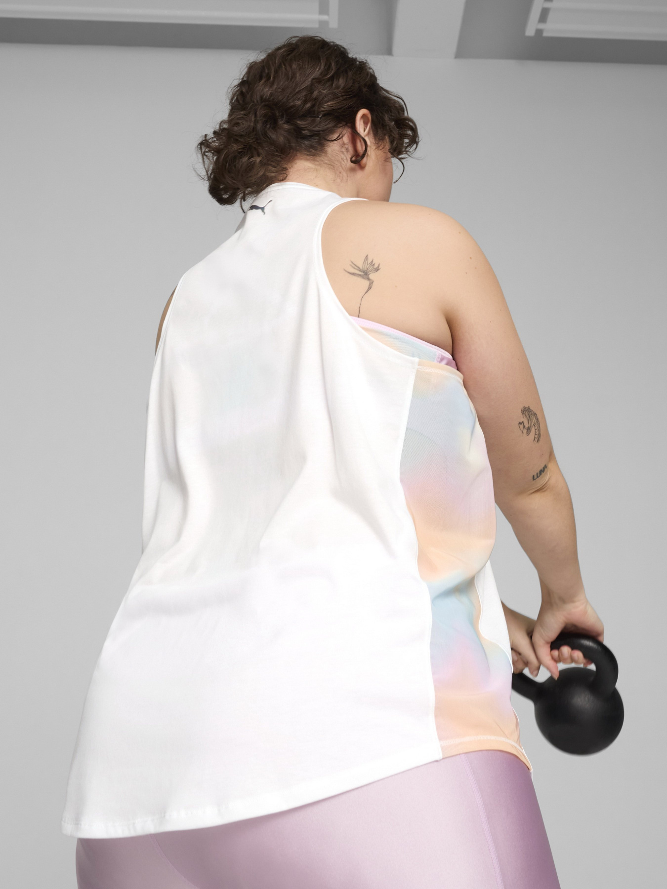 Спортивна майка PUMA SUMMER DAZE TRAINING TANK модель 52482302 Спортивна майка PUMA SUMMER DAZE TRAINING TANK модель 52482302 Фото