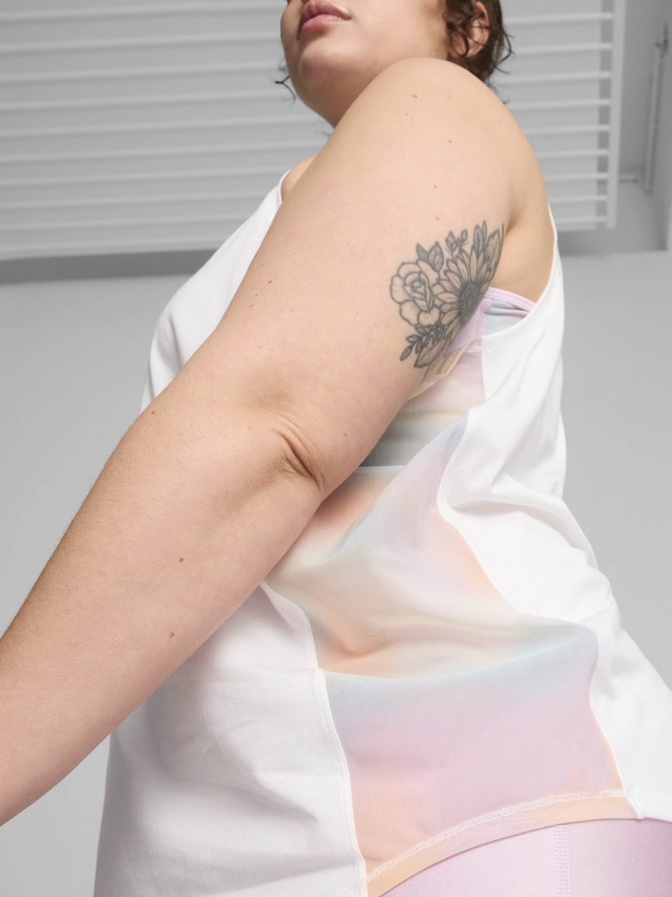 Спортивна майка PUMA SUMMER DAZE TRAINING TANK модель 52482302 Спортивна майка PUMA SUMMER DAZE TRAINING TANK модель 52482302 Фото