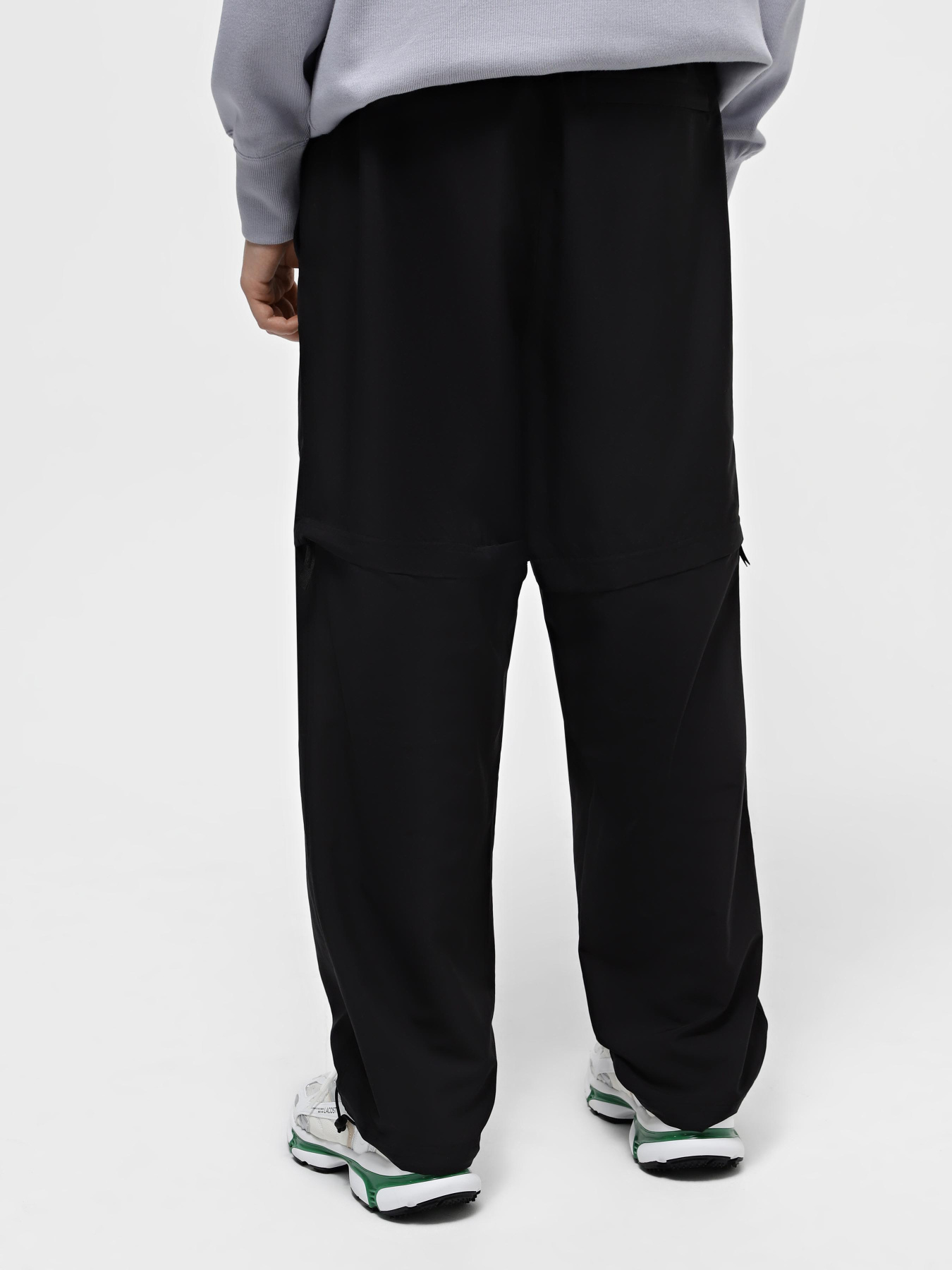 Спортивні штани PUMA DOWNTOWN 180 ZIP-OFF модель 62437801 Спортивні штани PUMA DOWNTOWN 180 ZIP-OFF модель 62437801 Фото