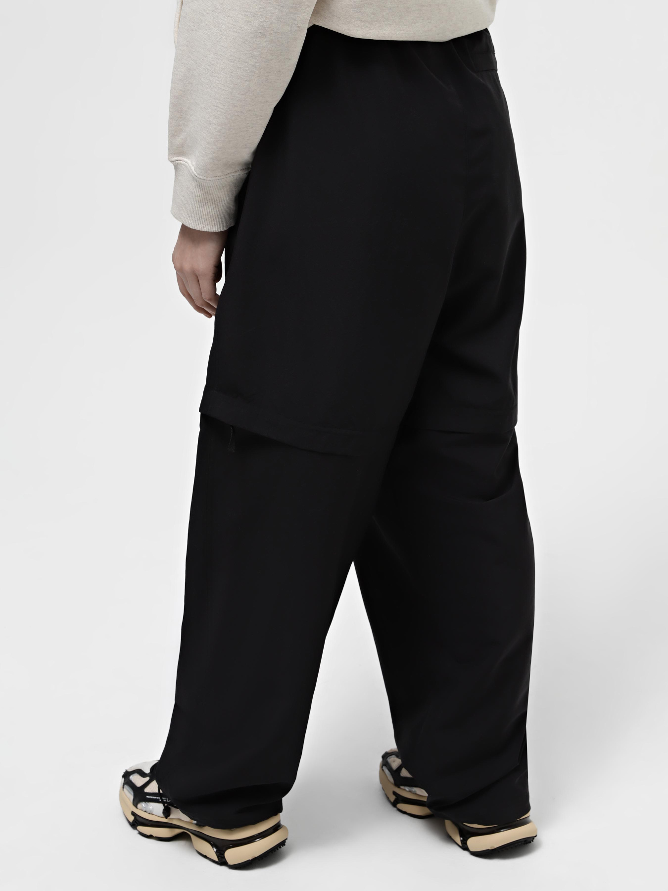 Спортивні штани PUMA DOWNTOWN 180 ZIP-OFF модель 62437801 Спортивні штани PUMA DOWNTOWN 180 ZIP-OFF модель 62437801 Фото